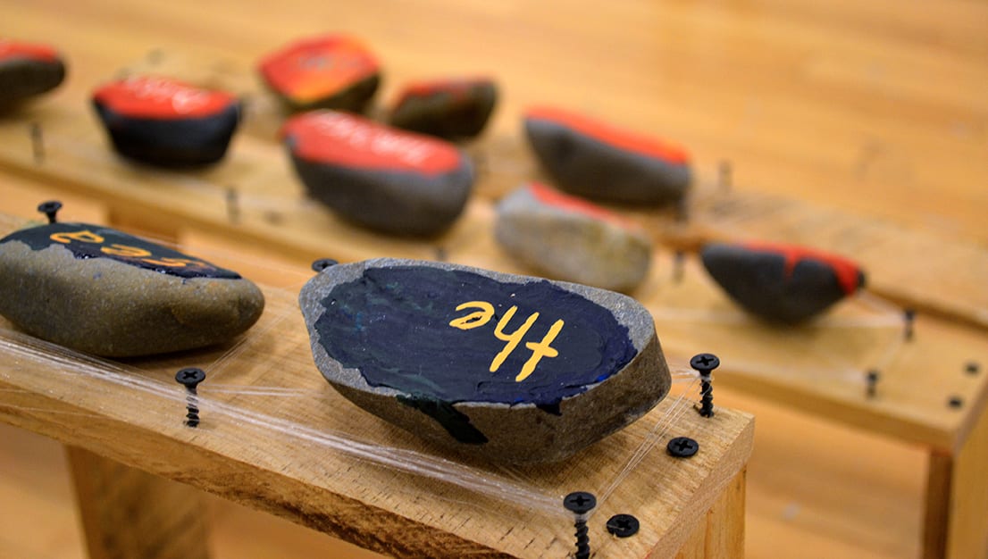 Rocks are painted with a story.