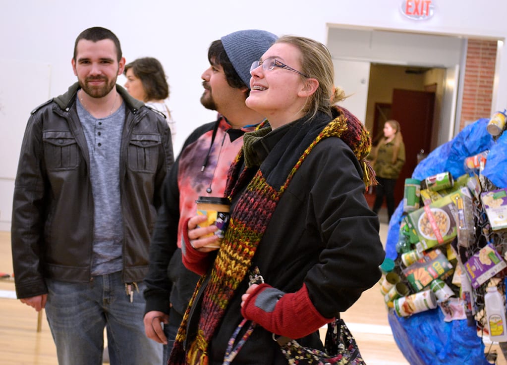 Students of the POW class present their works at the closing reception.