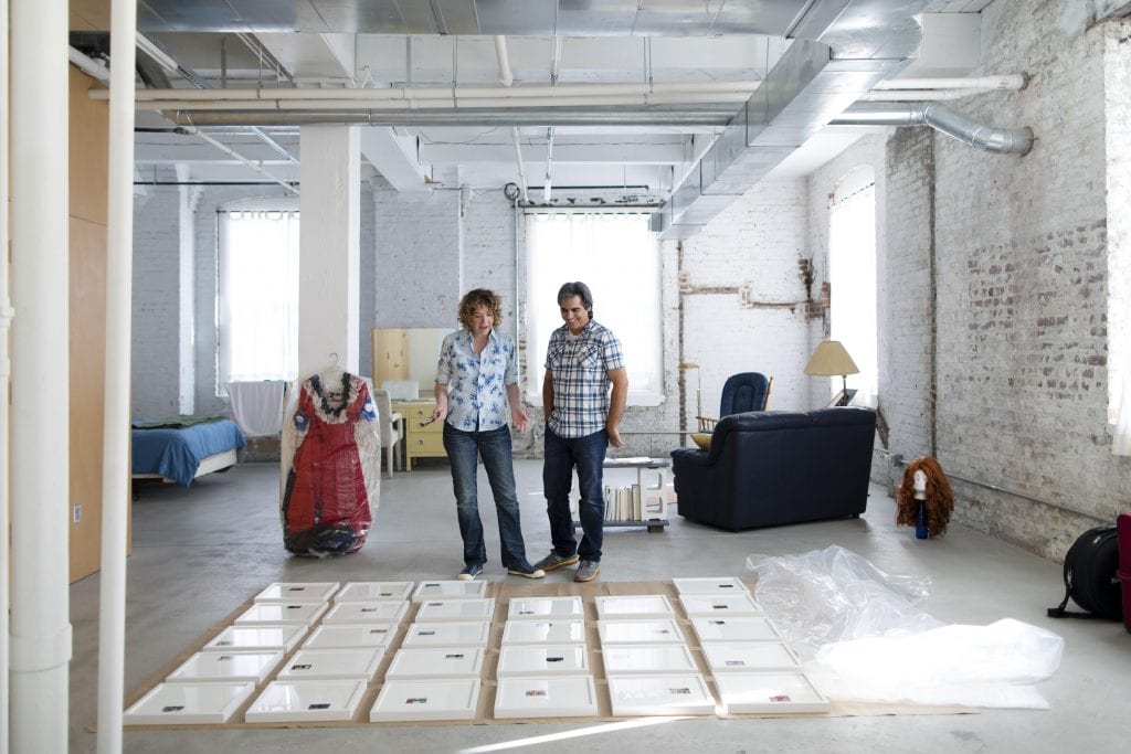 Gaelyn and Gustavo Aguilar, working on “A Taco Stand on Every Corner,” while in residence at the Bemis Center for Contemporary Arts in Omaha, Nebraska. (Photo by Colin Conces)