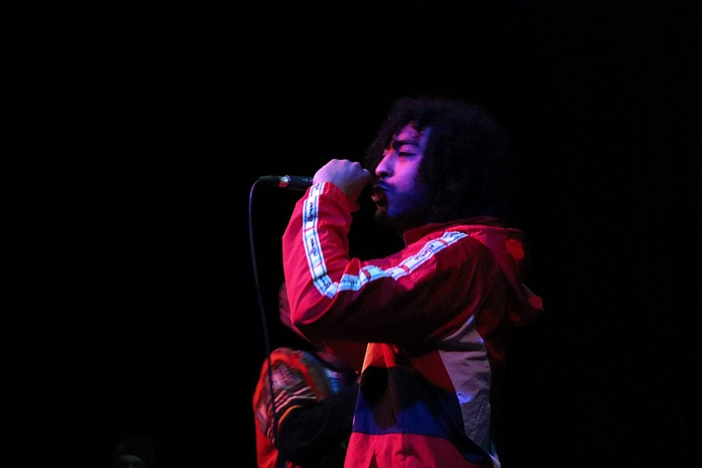 Milo performing at Emery Community Arts Center.